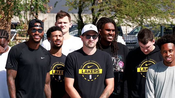 Basketball - NBA - Los Angeles Lakers visit to Ljubljana - Ljubljana, Slovenia - August 23, 2026 Los Angeles Lakers' Luka Doncic poses for a photo with teammates on the court where he played growing up in Ljubljana REUTERS/Borut Zivulovic Basketball - NBA - Los Angeles Lakers visit to Ljubljana - Ljubljana, Slovenia - August 23, 2026 Los Angeles Lakers' Luka Doncic poses for a photo with teammates on the court where he played growing up in Ljubljana REUTERS/Borut Zivulovic