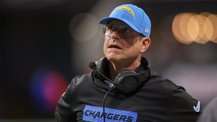 Los Angeles Chargers coach Jim Harbaugh reacts to a play on the sideline.