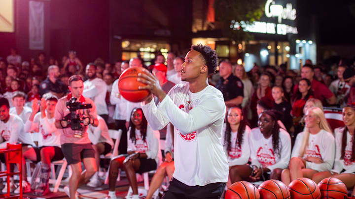 Indiana's Nick Dorn in the three-point contest during the Hoosier Hoops on Kirkwood event on Kirkwood Avenue just outside the Sample Gates on Thursday, Oct. 2, 2025.