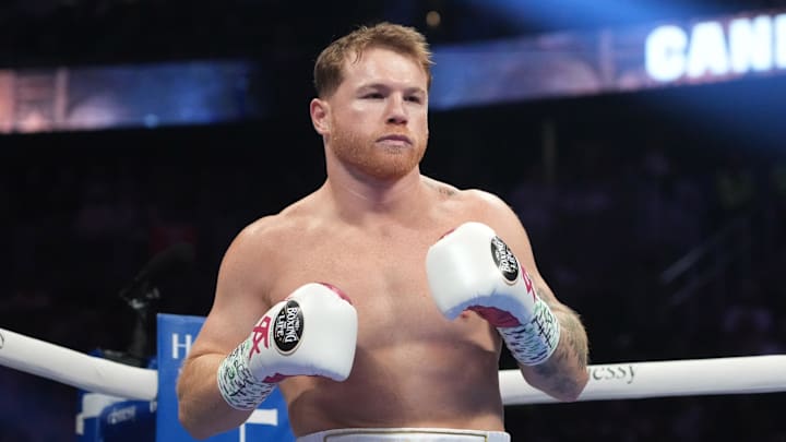 May 7, 2022; Las Vegas, Nevada, USA; Canelo Alvarez (pink trunks) and Dimitry Bivol (black trunks) box during their light heavyweight championship bout at T-Mobile Arena. Mandatory Credit: Joe Camporeale-Imagn Images May 7, 2022; Las Vegas, Nevada, USA; Canelo Alvarez (pink trunks) and Dimitry Bivol (black trunks) box during their light heavyweight championship bout at T-Mobile Arena. Mandatory Credit: Joe Camporeale-Imagn Images
