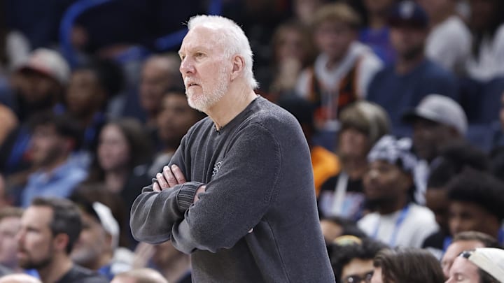 Oct 30, 2024; Oklahoma City, Oklahoma, USA; San Antonio Spurs head coach Gregg Popovich watches his team play against the Oklahoma City Thunder during the second half at Paycom Center. Oct 30, 2024; Oklahoma City, Oklahoma, USA; San Antonio Spurs head coach Gregg Popovich watches his team play against the Oklahoma City Thunder during the second half at Paycom Center.