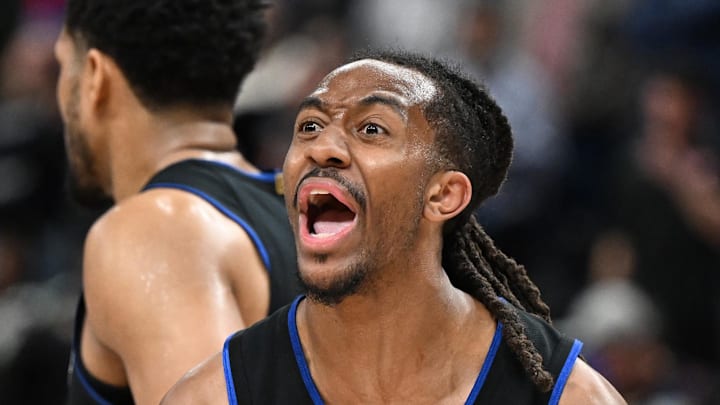 Feb 27, 2026; Detroit, Michigan, USA;  Detroit Pistons guard Daniss Jenkins (24) argues a foul call against the Cleveland Cavaliers with an official in overtime at Little Caesars Arena. Mandatory Credit: Lon Horwedel-Imagn Images