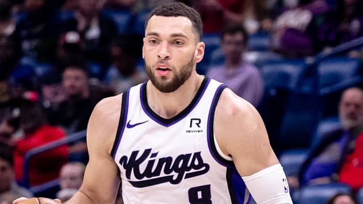 Feb 12, 2025; New Orleans, Louisiana, USA;  Sacramento Kings guard Zach LaVine (8) brings the ball up court against the New Orleans Pelicans during the first half at Smoothie King Center. Mandatory Credit: Stephen Lew-Imagn Images
