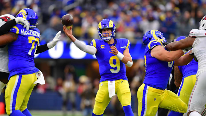 Jan 4, 2026; Inglewood, California, USA;  Los Angeles Rams quarterback Matthew Stafford (9) throws downfield against the Arizona Cardinals during the first half at SoFi Stadium. Mandatory Credit: Gary A. Vasquez-Imagn Images