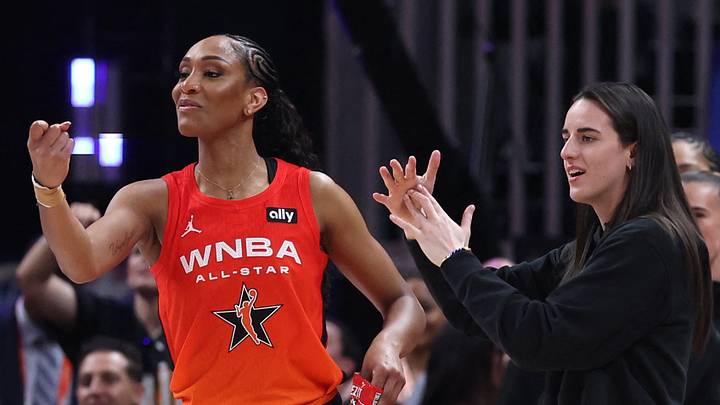 Team Clark guard Caitlin Clark (22) and center A'ja Wilson (22) react on the bench in the fourth quarter against Team Collier the 2025 WNBA All Star Game Team Clark guard Caitlin Clark (22) and center A'ja Wilson (22) react on the bench in the fourth quarter against Team Collier the 2025 WNBA All Star Game