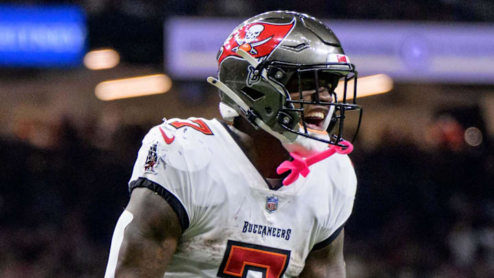 Oct 13, 2024; New Orleans, Louisiana, USA; Tampa Bay Buccaneers running back Bucky Irving (7) celebrates during the fourth quarter against the New Orleans Saints at Caesars Superdome. Mandatory Credit: Matthew Hinton-Imagn Images