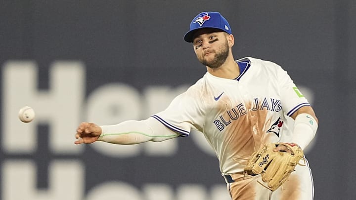 Apr 29, 2025; Toronto, Ontario, CAN; Toronto Blue Jays shortstop Bo Bichette (11) throws out Boston Red Sox left fielder Jarren Duran (not pictured) to end the top of the sixth inning at Rogers Centre. 