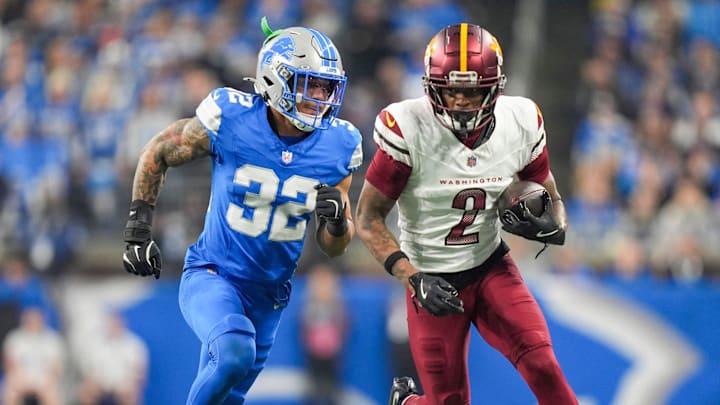 Detroit Lions safety Brian Branch (32) runs after Washington Commanders wide receiver Dyami Brown (2) 