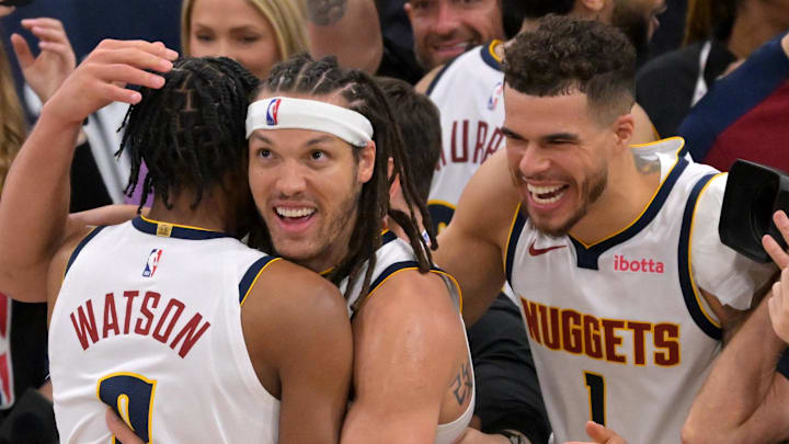 Apr 26, 2025; Inglewood, California, USA; Denver Nuggets forward Aaron Gordon (32) is congratulated by forward Peyton Watson (8) and forward Michael Porter Jr. (1) after the game winning dunk to defeat the Los Angeles Clippers 101-99 in game four of round one of the 2024 NBA Playoffs at Intuit Dome. Mandatory Credit: Jayne Kamin-Oncea-Imagn Images