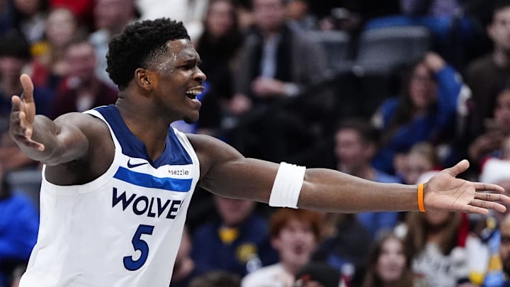 Dec 25, 2025; Denver, Colorado, USA; Minnesota Timberwolves guard Anthony Edwards (5) reacts against the Denver Nuggets during the first half at Ball Arena. Mandatory Credit: Ron Chenoy-Imagn Images