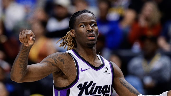 Nov 3, 2025; Denver, Colorado, USA; Sacramento Kings guard Keon Ellis (23) reacts after a basket in the third quarter against the Denver Nuggets at Ball Arena.
