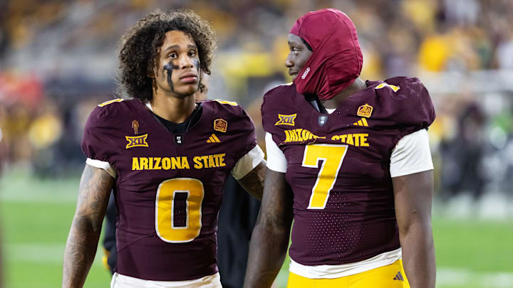 Nov 28, 2025; Tempe, Arizona, USA; Arizona State Sun Devils wide receiver Jordyn Tyson (0) with tight end Chamon Metayer (7) against the Arizona Wildcats during the 99th Territorial Cup at Mountain America Stadium. Mandatory Credit: Mark J. Rebilas-Imagn Images