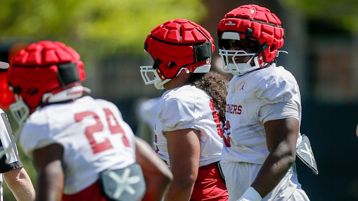 Oklahoma defensive linemen David Stone and Jayden Jackson work at practice. Oklahoma defensive linemen David Stone and Jayden Jackson work at practice.