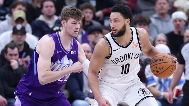 Jan 12, 2025; Salt Lake City, Utah, USA;Brooklyn Nets guard Ben Simmons (10) posts up against Utah Jazz forward Kyle Filipowski (22) during the third quarter at Delta Center. Mandatory Credit: Rob Gray-Imagn Images
