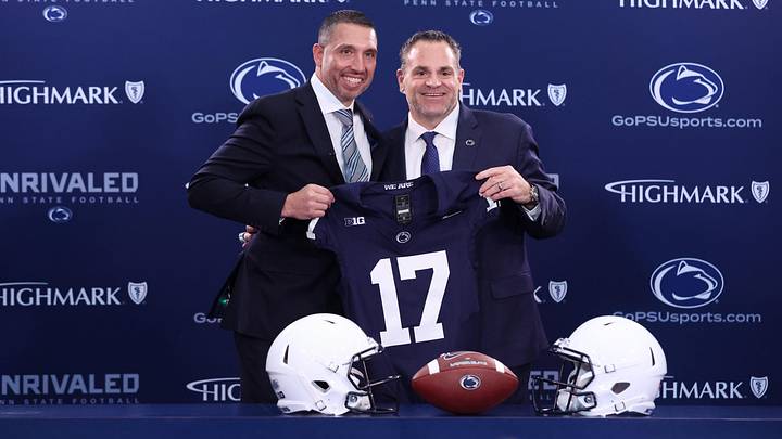 Dec 8, 2025; University Park, PA, USA; Matt Campbell, left,  and Penn State University athletic director Pat Kraft, right, pose for a photo after Matt Campbell is announced as the Penn State Nittany Lions new head coach during a press conference at the Beaver Stadium Press Room. Mandatory Credit: Matthew O'Haren-Imagn Images