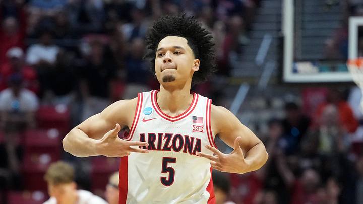 Arizona Wildcats guard Brayden Burries (5) reacts in the second half against the Utah State Aggies during a second round game of the men's 2026 NCAA Tournament at Viejas Arena on March 22, 2026.