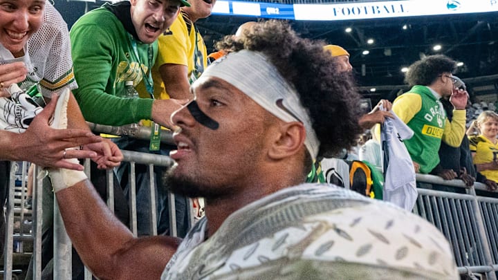 Oregon tight end Kenyon Sadiq celebrates with fans as the Oregon Ducks face the Penn State Nittany Lions on Sept. 27, 2025, at Beaver Stadium in University Park, Pennsylvania. Oregon tight end Kenyon Sadiq celebrates with fans as the Oregon Ducks face the Penn State Nittany Lions on Sept. 27, 2025, at Beaver Stadium in University Park, Pennsylvania.