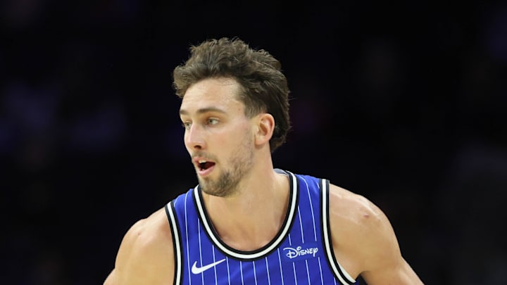Orlando Magic forward Franz Wagner dribbles the ball against the Philadelphia 76ers. Orlando Magic forward Franz Wagner dribbles the ball against the Philadelphia 76ers.
