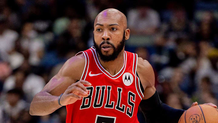 Nov 24, 2025; New Orleans, Louisiana, USA;  Chicago Bulls guard Jevon Carter (5) brings the ball up court against New Orleans Pelicans center Derik Queen (not pictured) during the second half at Smoothie King Center. Mandatory Credit: Stephen Lew-Imagn Images
