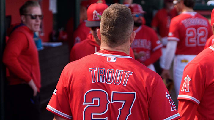 Feb 24, 2026; Tempe, Arizona, USA; Los Angeles Angels designated hitter Mike Trout (27) walks through the dugout before the start of a spring training game against the San Francisco Giants at Tempe Diablo Stadium. Mandatory Credit: Allan Henry-Imagn Images