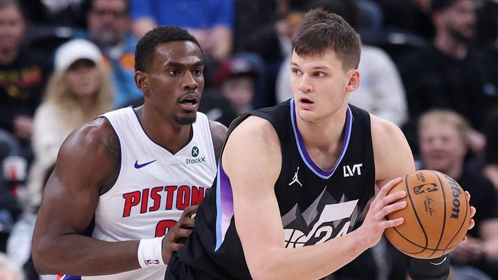 Mar 3, 2025; Salt Lake City, Utah, USA; Utah Jazz center Walker Kessler (24) posts up against Detroit Pistons center Jalen Duren (0) during the first half at Delta Center. Mandatory Credit: Rob Gray-Imagn Images