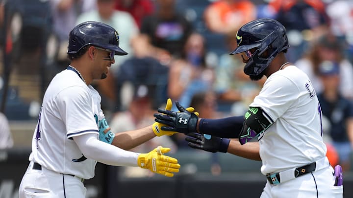 Tampa Bay's Junior Caminero (right) celebrates with Christopher Morel after hitting a home run against the Detroit Tigers. Tampa Bay's Junior Caminero (right) celebrates with Christopher Morel after hitting a home run against the Detroit Tigers.