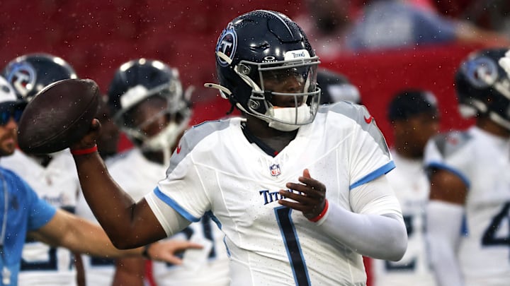 Aug 9, 2025; Tampa, Florida, USA; Tennessee Titians quarterback Cam Ward (1) works out prior to the game against the Tampa Bay Buccaneers at Raymond James Stadium. Mandatory Credit: Kim Klement Neitzel-Imagn Images
