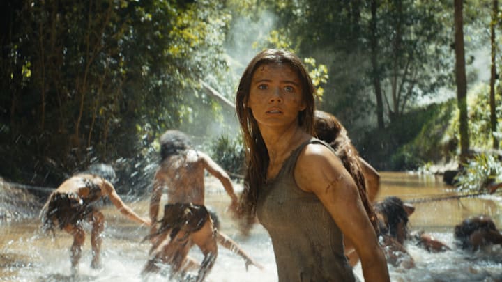 (Center): Freya Allan as Nova in 20th Century Studios' KINGDOM OF THE PLANET OF THE APES. Photo courtesy of 20th Century Studios. © 2024 20th Century Studios. All Rights Reserved.