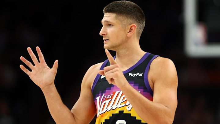 Mar 28, 2026; Phoenix, Arizona, USA; Phoenix Suns guard Grayson Allen (8) against the Utah Jazz in the first half at Mortgage Matchup Center. Mandatory Credit: Mark J. Rebilas-Imagn Images