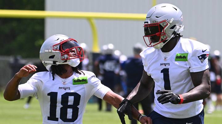 Jun 2, 2026; Foxborough, MA, USA; New England Patriots wide receiver Kyle Williams (18) tracks the ball while being covered by wide receiver A.J. Brown (1) during the team's OTA at Gillette Stadium. Mandatory Credit: Eric Canha-Imagn Images Jun 2, 2026; Foxborough, MA, USA; New England Patriots wide receiver Kyle Williams (18) tracks the ball while being covered by wide receiver A.J. Brown (1) during the team's OTA at Gillette Stadium. Mandatory Credit: Eric Canha-Imagn Images