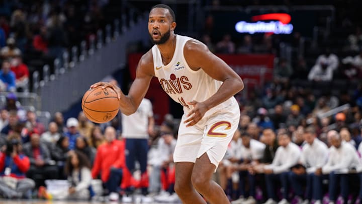 Oct 26, 2024; Washington, District of Columbia, USA; Cleveland Cavaliers forward Evan Mobley (4) dribbles the ball up the court against the Washington Wizards during the third quarter at Capital One Arena. Mandatory Credit: Reggie Hildred-Imagn Images
