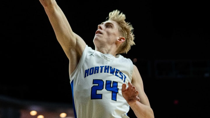 Waukee Northwest's Colin Rice (24) scores off a layup against Cedar Rapids Kennedy on Monday, March 10, 2025, at Wells Fargo Arena in Des Moines.