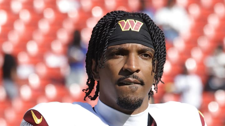 Washington Commanders quarterback Jayden Daniels walks off the field after the game against the New York Giants. Washington Commanders quarterback Jayden Daniels walks off the field after the game against the New York Giants.