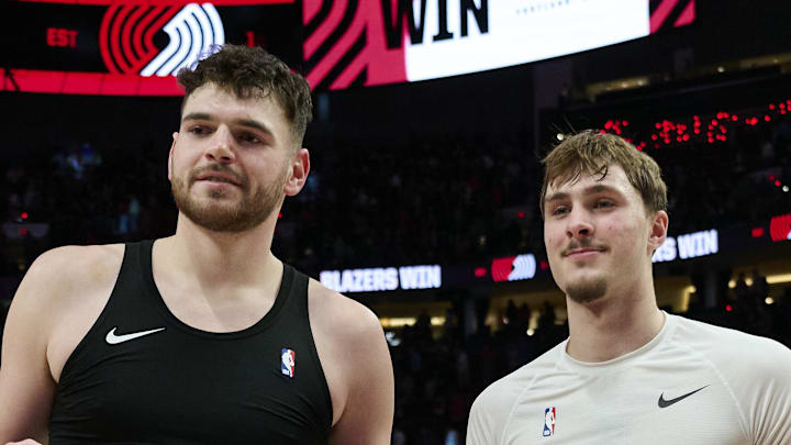 Portland Trail Blazers center Donovan Clingan and Dallas Mavericks forward Cooper Flagg. Portland Trail Blazers center Donovan Clingan and Dallas Mavericks forward Cooper Flagg.