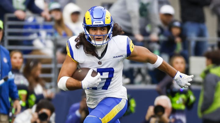 Nov 3, 2024; Seattle, Washington, USA; Los Angeles Rams wide receiver Puka Nacua (17) runs for yards after the catch against the Seattle Seahawks during the second quarter at Lumen Field. Mandatory Credit: Joe Nicholson-Imagn Images