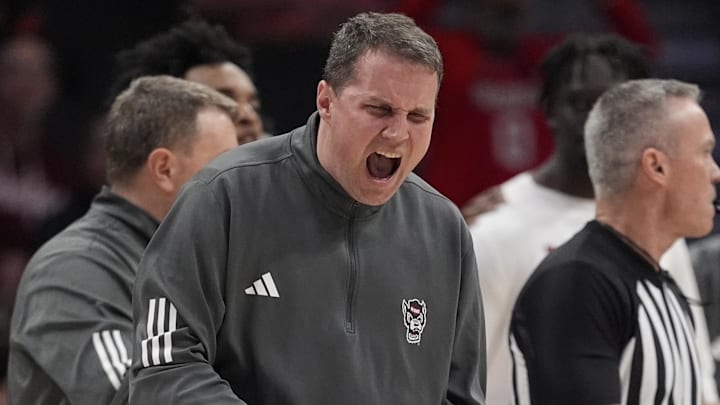 Mar 11, 2026; Charlotte, NC, USA; NC State Wolfpack head coach Will Wade reacts to a score during the second half against the Pittsburgh Panthers at Spectrum Center. Mandatory Credit: Jim Dedmon-Imagn Images