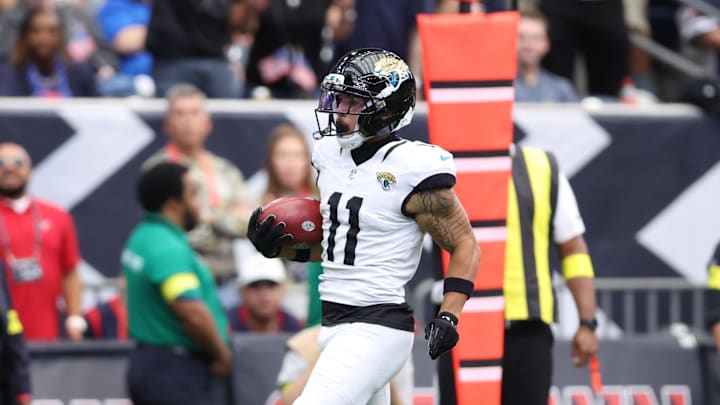 Nov 9, 2025; Houston, Texas, USA; Jacksonville Jaguars wide receiver Parker Washington (11) returns a punt for a touchdown against the Houston Texans during the first half at NRG Stadium. Mandatory Credit: Troy Taormina-Imagn Images