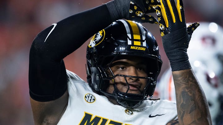 Missouri Tigers defensive tackle Chris McClellan (7) celebrates his sack against Auburn.