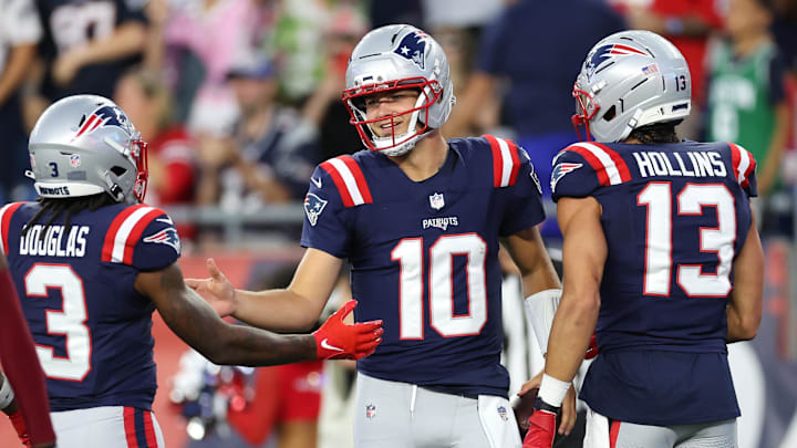 Aug 8, 2025; Foxborough, Massachusetts, USA; New England Patriots quarterback Drake Maye (10) celebrates after scoring a touchdown during the first half against the Washington Commanders at Gillette Stadium. Mandatory Credit: Paul Rutherford-Imagn Images