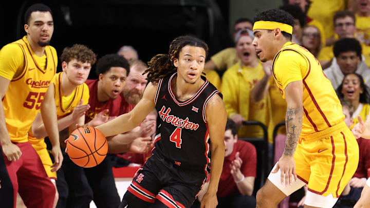 Feb 16, 2026; Ames, Iowa, USA; Iowa State Cyclones guard Tamin Lipsey (3) defends Houston Cougars guard Kingston Flemings (4) during the first half at James H. Hilton Coliseum. Mandatory Credit: Reese Strickland-Imagn Images
