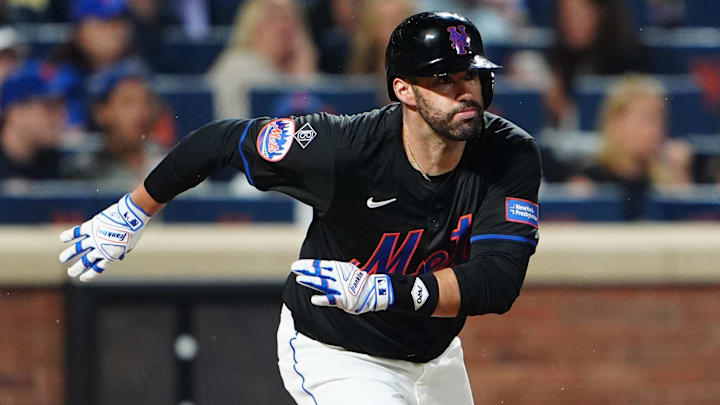 Jun 14, 2024; New York City, New York, USA; New York Mets designated hitter JD Martinez (28) runs out an RBI double against the San Diego Padres during the third inning at Citi Field.