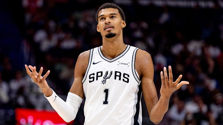 Oct 24, 2025; New Orleans, Louisiana, USA;  San Antonio Spurs forward/center Victor Wembanyama (1) reacts to being fouled by New Orleans Pelicans center Derik Queen (not pictured) during the second half at Smoothie King Center. Mandatory Credit: Stephen Lew-Imagn Images
