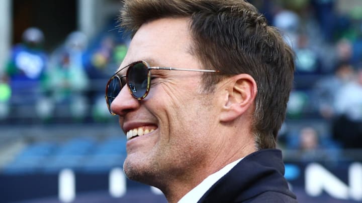 Jan 25, 2026; Seattle, WA, USA; Tom Brady signs autographs before the 2026 NFC Championship Game between the Seattle Seahawks and the Los Angeles Rams at Lumen Field. Mandatory Credit: Kevin Ng-Imagn Images Jan 25, 2026; Seattle, WA, USA; Tom Brady signs autographs before the 2026 NFC Championship Game between the Seattle Seahawks and the Los Angeles Rams at Lumen Field. Mandatory Credit: Kevin Ng-Imagn Images