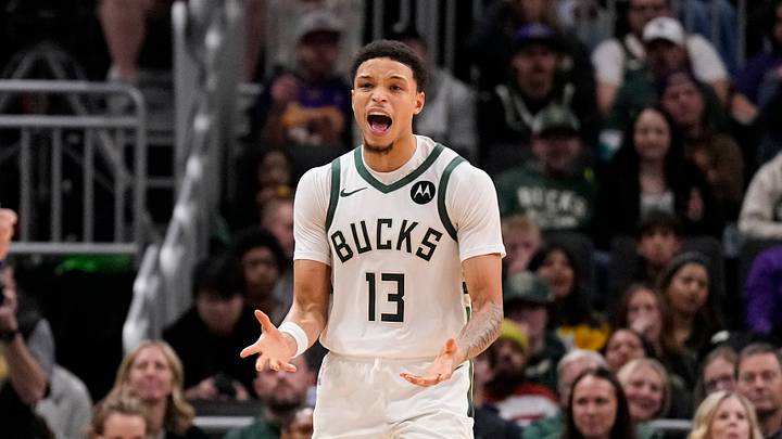 Milwaukee Bucks guard Ryan Rollins (13) reacts after being called for a foul during the third quarter against the Los Angeles Lakers at Fiserv Forum on November 15, 2025.