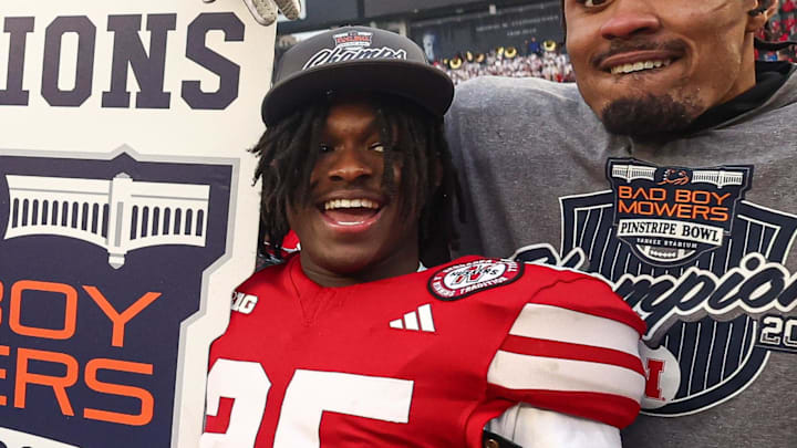 Dec 28, 2024; Bronx, NY, USA; Nebraska Cornhuskers running back Kenneth Williams (25) celebrates with teammates after the game against the Boston College Eagles at Yankee Stadium. Mandatory Credit: Vincent Carchietta-Imagn Images