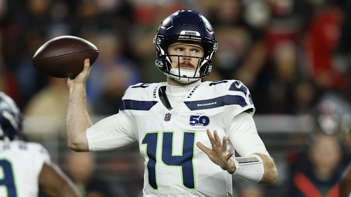 Jan 3, 2026; Santa Clara, California, USA; Seattle Seahawks quarterback Sam Darnold (14) drops back to pass against the San Francisco 49ers during the first half at Levi's Stadium.