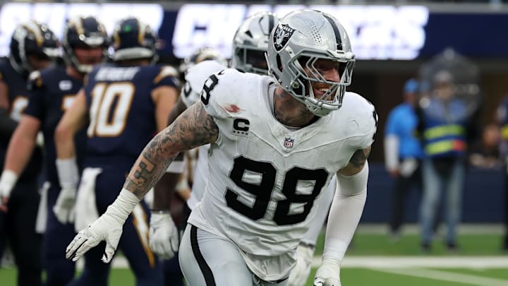 Nov 30, 2025; Inglewood, California, USA; Las Vegas Raiders defensive end Maxx Crosby (98) reacts after a tackle against the Los Angeles Chargers during the second half at SoFi Stadium. Mandatory Credit: Kiyoshi Mio-Imagn Images