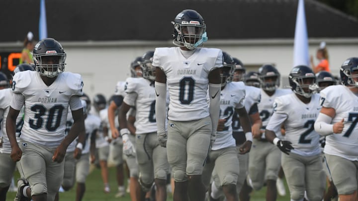 The Dorman Cavaliers take to the field Friday, Aug. 22, 2025 during the SCHSL football game against the Greenville Red Raiders at Greenville High School in Greenville, South Carolina.