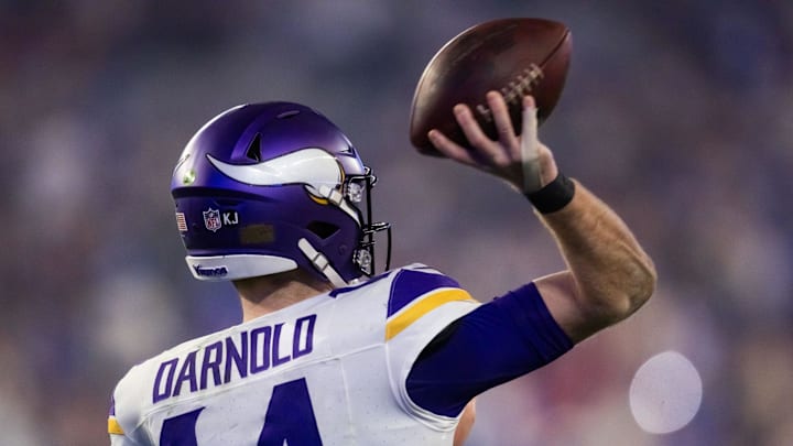 Jan 13, 2025; Glendale, AZ, USA; Detailed view of the jersey of Minnesota Vikings quarterback Sam Darnold (14) against the Los Angeles Rams during an NFC wild card game at State Farm Stadium. Mandatory Credit: Mark J. Rebilas-Imagn Images