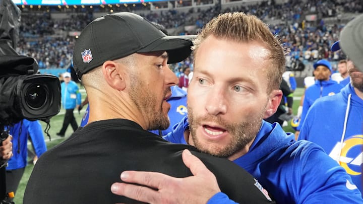 Jan 10, 2026; Charlotte, NC, USA; Los Angeles Rams head coach Sean McVay and Carolina Panthers head coach Dave Canales meet after the game in the NFC Wild Card Round game at Bank of America Stadium. Mandatory Credit: Bob Donnan-Imagn Images Jan 10, 2026; Charlotte, NC, USA; Los Angeles Rams head coach Sean McVay and Carolina Panthers head coach Dave Canales meet after the game in the NFC Wild Card Round game at Bank of America Stadium. Mandatory Credit: Bob Donnan-Imagn Images